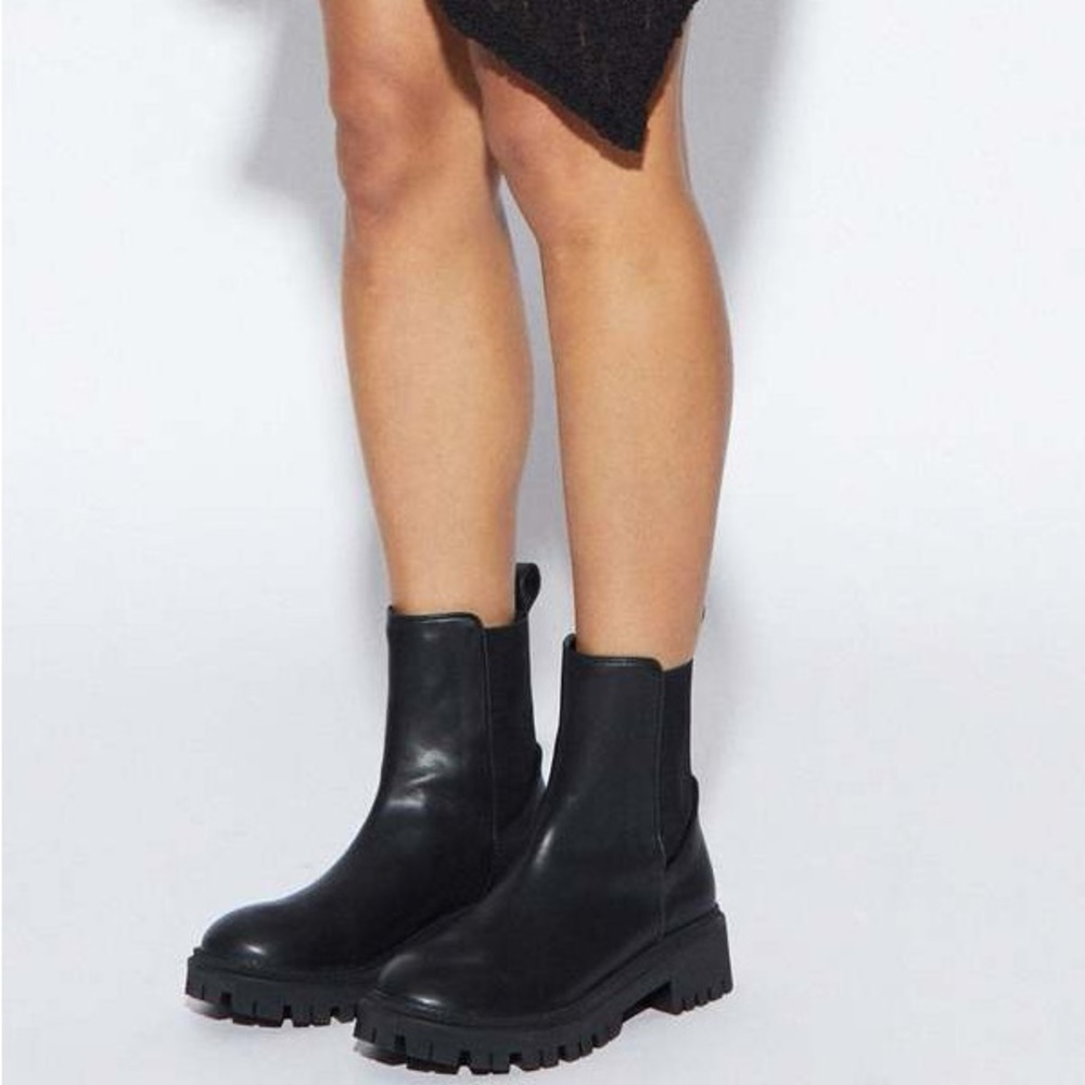 Never worn. Intentionally Blank’s guided pull on lug sole boot.